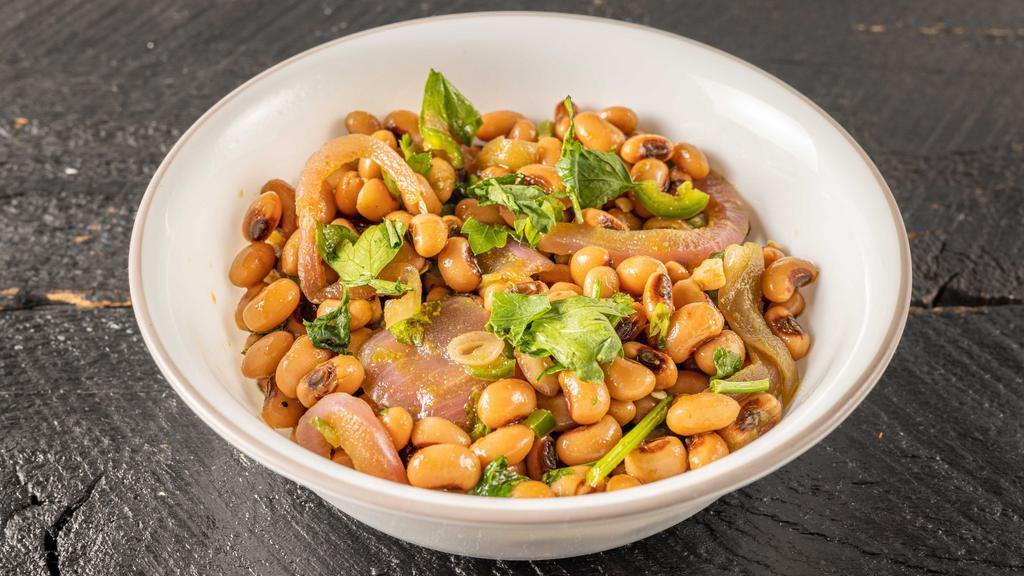 Black-Eyed Pea Salad · Small. Team favorite, chef's special black-eyed pea salad with veggies, super fresh lime - cilantro dressing. Fresh and healthy salad craving, perfect on its own or side to burger or topped with plant-based protein for additional price, tandoori chicken for additional price.