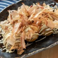 Takoyaki (6 Pieces) · Takoyaki is a ball-shaped Japanese snack made of a wheat flour-based batter and cooked in a ...