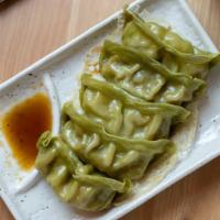 Veggie Gyoza (5 Pieces) · Vegetarian. Veggie dumpling 5 pieces
