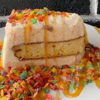 Fruity Pebbles Ice Cream Cake · A rainbow delight; our Fruity Pebbles ® ice cream paired with vanilla cake.