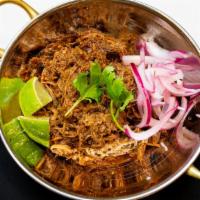 Goan Pork Vindalo · Fiery pork curry made with kashmiri red chili and tamarind. Gluten free / dairy free.