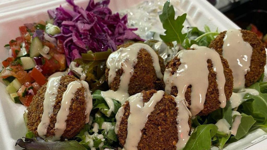 Falafel (5 Pieces) · Fried patty with chickpeas, onion, and garlic.