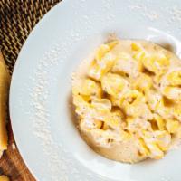 Fiocchetti Pere & Asiago · Beggars Purses Filled with Pear in a Walnut Cream Sauce
