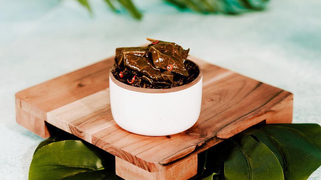 Braised Greens · Slowly braised greens in our house signature spices with a touch of sweetness.