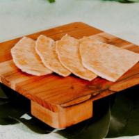 Paratha · Buttery Flatbread, add on to any dish.