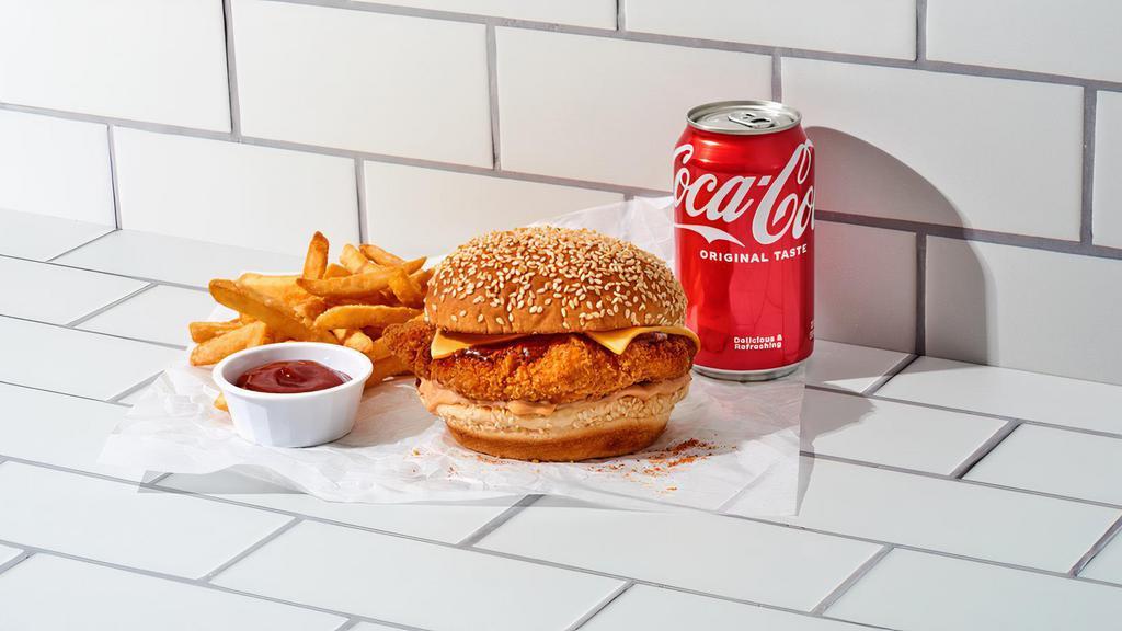 Chicken N' Cheese Combo · Packed with flavor from our mouthwatering crispy chicken on a toasted buttery roll with ooey-gooey cheese. Your choice of spice, fries, and a drink.