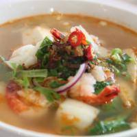 Tom Yum Seafood Soup · Shrimp, scallops, squid & fish cake, light sweet & Sour soup with a touch of spicy chili pas...