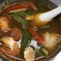 Shrimp Tom Yum Soup · Light sweet& sour soup with a touch of spicy chili paste put together with mushrooms, lemong...