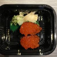 Salmon Roe · Sushi is slices of fish on sushi rice two pieces and sashimi is slices of fish three pieces.