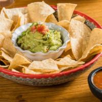 Classic Guacamole · Avocado, Tomato, Cilantro, and Onion. *Served With House Made Gluten Free Chips and Salsa Ro...