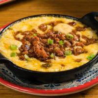 Queso Fundido (Plain) · Monterey and Cheddar Cheese, and Scallion Garnish.