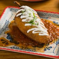 Chile Relleno · Crispy Poblano Pepper Stuffed With Mushrooms, Peppers, Carrots, Onions, and Mozzarella Cheese.