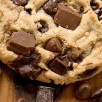 King Sized Cookie Tray · Our decadent king sized cookies are a real crowd pleaser! An assortment of triple chocolate ...