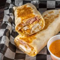 #70. Cordon Bleu Wrap · Crispy tender breaded chicken, ham and Swiss cheese drizzled with dijon dressing in a perfec...