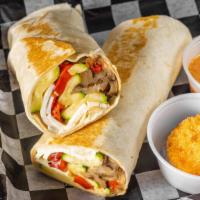 #36. Veggie Wrap · Grilled eggplant and zucchini stuffed in a toasted wrap with roasted peppers and fresh mozza...