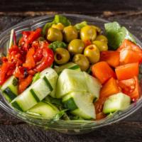 #61. Garden Salad · Fresh mixed green, tomatoes, olives, sliced cucumbers and seasoned fire roasted peppers toss...