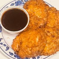 Shrimp Egg Foo Young · 3 egg patties filled with vegetables and shrimp and fried. Comes with white rice. Served wit...