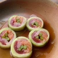 House Special Roll · Tuna, Asparagus, Salmon, Yellowtail on Cucumber Wrap.