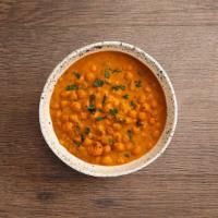 Chana Masala · Garbanzo beans cooked in sharp spices.