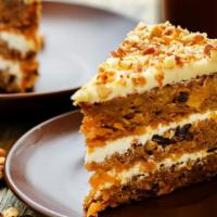 Carrot Cake · Fresh baked cake prepared with grated carrots, ground cloves and cinnamon and topped with a ...