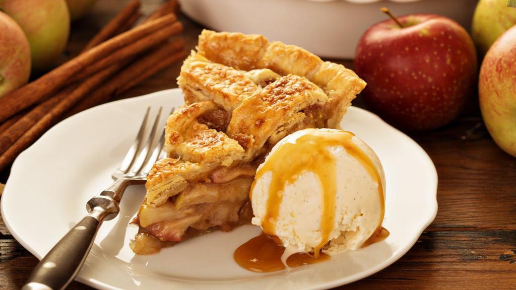 Warm Apple Pie · Traditional warm apple pie prepared in a buttery crust with a sweet apple cinnamon filling.