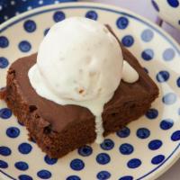 Jumbo Brownie A La Mode · Chocolatey jumbo brownie fresh out of the oven and topped with haagen dazs vanilla ice cream.