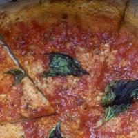 Marinara Pie · San Marzano tomato sauce, garlic, basil, EVOO  and oregano.(No Mozzarella)