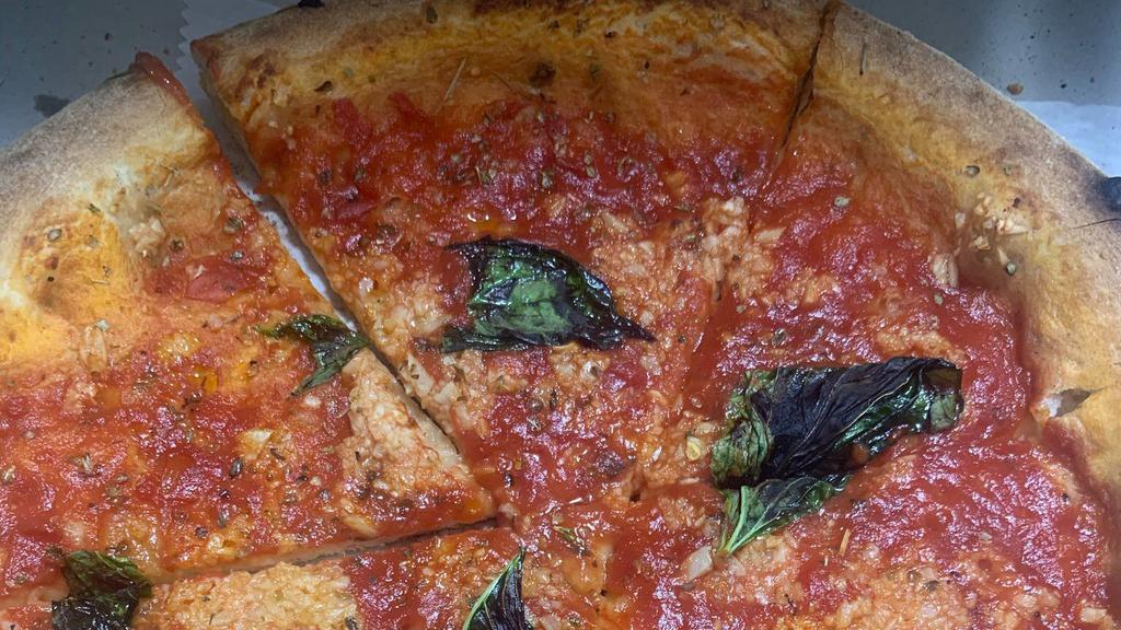 Marinara Pie · San Marzano tomato sauce, garlic, basil, EVOO  and oregano.(No Mozzarella)