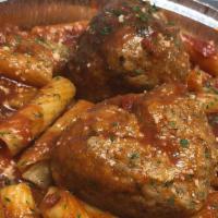 Sunday Gravy · Pasta with meatball, sausage, short rib, stewed in tomato sauce.