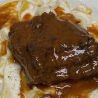 Beef Short Ribs · Served over Cacio e Pepe Pasta (House Made pappardelle in a parmesan sauce, sprinkled with b...