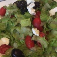 Chopped Salad · Black olives, cherry tomatoes and goat cheese.