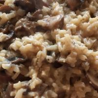 Mixed Mushroom Risotto · Arborio rice stewed with mushrooms and Parmesan cheese.