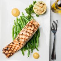 Grilled Salmon Dijon · Surrounded by dijon mustard, wine and lemon reduction, vegetables pasta in red sauce or garl...