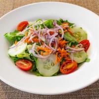 House Salad · Lettuce, tomato, cucumbers, olives, onions.