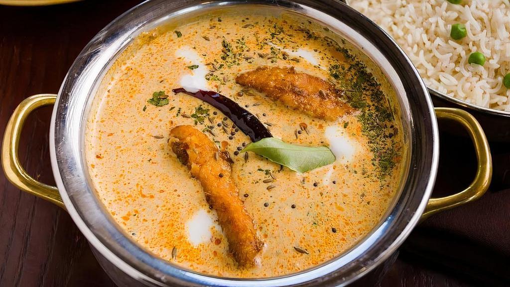 Fish Moilee · Cooked with coconut, turmeric and ginger.