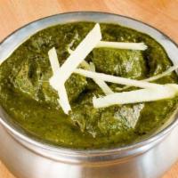Murgh Saag · Chicken cooked with spinach and ginger.