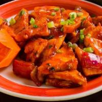 Chili Paneer (Dry) · Paneer cheese tossed with scallions, green chilies, bell peppers, onions,  and soy ginger gr...