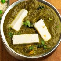 Saag Paneer · Spinach and cheese with garden herbs.