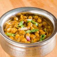 Chana Masala · Chickpeas with onions and garden herbs.