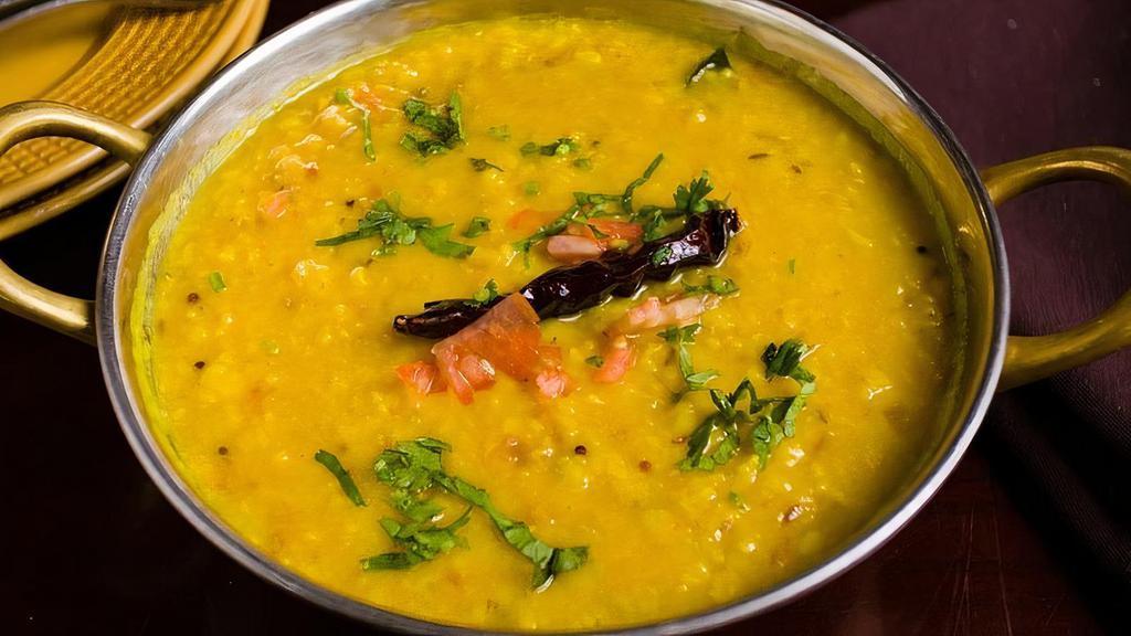 Dal Tadka · Yellow lentils tempered with cumin seeds.