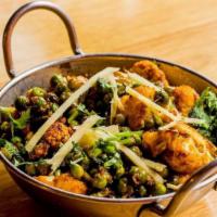 Bhuni Gobi Mattar · Cauliflower and green peas with ginger.