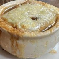 French Onion · Classic French Onion soup, topped with bread and melted cheese.