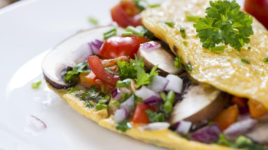 Veggie Omelette · Delicious mixed veggies and cheese.