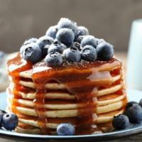 Blueberry Pancakes · Delicious fluffy pancakes with fresh blueberries.