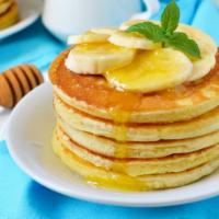 Banana Pancakes · Delicious fluffy pancakes with fresh bananas.