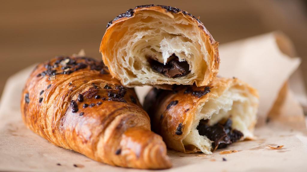 Chocolate Croissant · Buttery and flaky pastry with chocolate.
