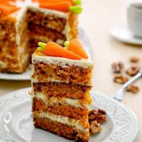 Sliced Carrot Cake · Freshly cut carrots baked into a soft delicious cake.