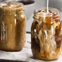 Iced Coffee · Cold coffee beverage with sweeteners.