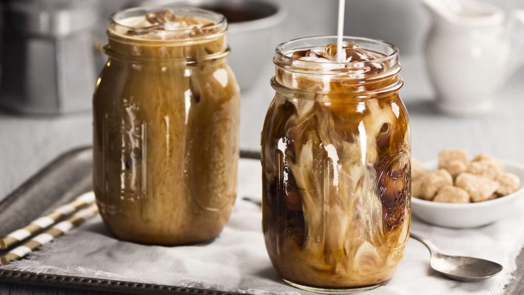 Iced Coffee · Cold coffee beverage with sweeteners.