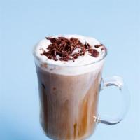 Iced Mocha · Espresso combined with mocha sauce, milk and ice topped with sweetened whipped cream.